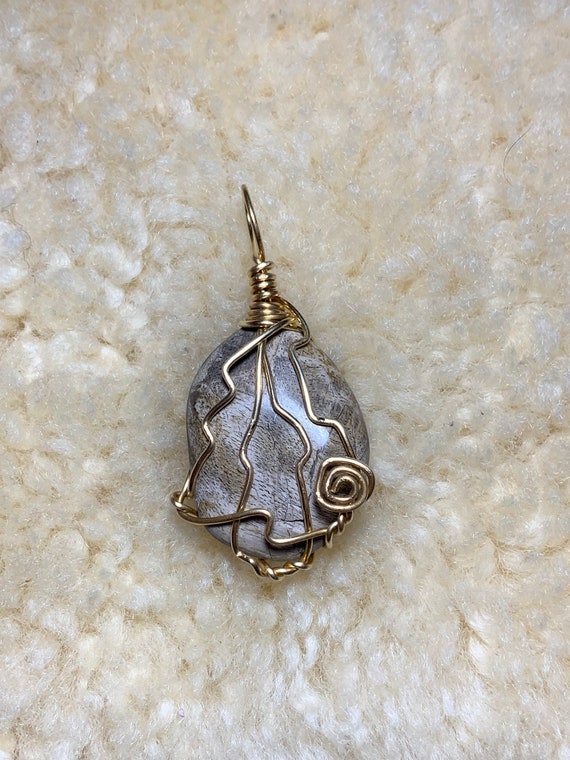 Beautiful wire wrapped Creek stone pendant