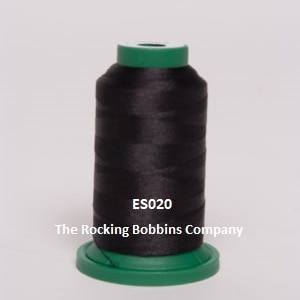May include: A spool of black thread with a green base and the text "ES020 The Rocking Bobbins Company" on the label.