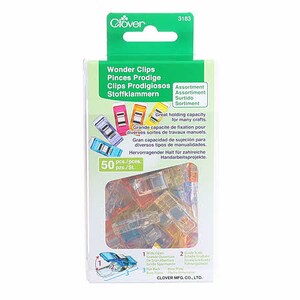 May include: A package of 50 assorted Wonder Clips, also known as Pinces Prodige, Clips Prodigiosos, or Stoffklammern. The clips are clear plastic and come in a variety of colors, including red, orange, yellow, green, blue, and purple. The package includes instructions for using the clips.
