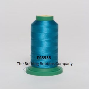May include: A spool of teal blue thread with the text "ES5555 The Rocking Bobbins Company" on the label.