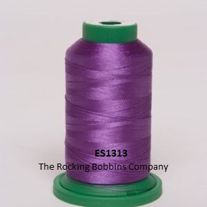 May include: A spool of purple embroidery thread with the text "ES1313 The Rocking Bobbins Company" on the label.