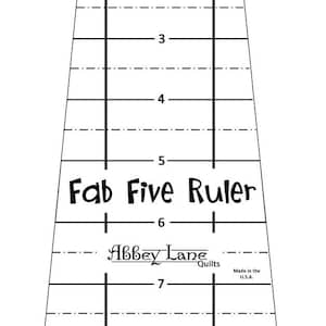 May include: Black and white Fab Five Ruler with markings up to 9 inches. The ruler has the text "Fab Five Ruler" and "Abbey Lane Quilts" printed on it. It also says "Made in the U.S.A."