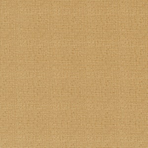 May include: A close-up of a tan fabric with a textured, woven appearance. The fabric has a subtle grid pattern and small, darker flecks throughout, creating a natural, organic look. The overall color is a warm, neutral tone.