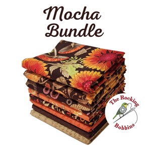 May include: A stack of 10 fabric squares in a fall color palette of brown, orange, and yellow. The fabric features a floral pattern with sunflowers and leaves. The fabric is labeled "Mocha Bundle" and "The Rocking Bobbins".
