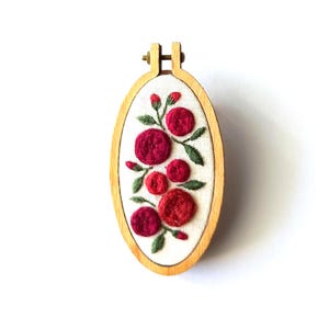 Handmade oval flower embroidered drum brooch