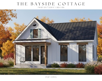 May include: A white cottage with a black roof and black-framed windows. The house has a small porch and is surrounded by colorful autumn foliage. The text "THE BAYSIDE COTTAGE" is at the top of the image.