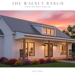 May include: A white farmhouse with a grey metal roof and a covered porch. The house features black-framed windows and a porch with wooden supports. The text "THE WALNUT RANCH" is at the top. Colourful flowers line the front of the house.