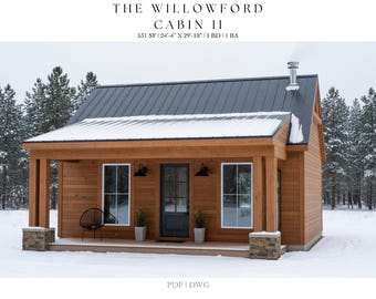 May include: A small, wooden cabin with a dark gray metal roof, covered in snow. The cabin has two windows, a black door, and a porch. The text "THE WILLOWFORD CABIN II" is at the top of the image, along with the cabin's square footage and dimensions.