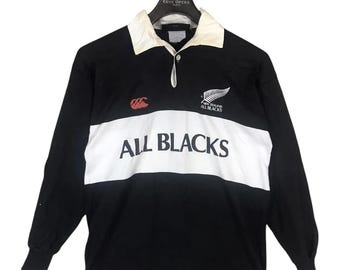Vintage 90s all black canterbury of new zealand rugby jersey striped polo