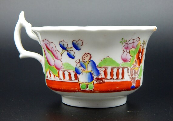 A Hilditch Polychrome Cup /& Saucer Duo