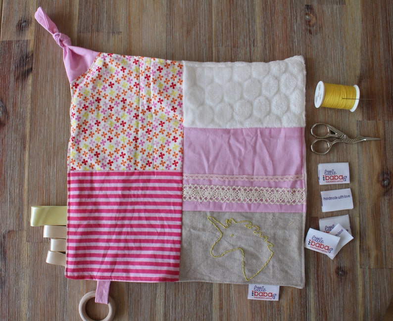 muslin taggie blanket