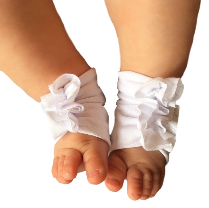 white hard bottom baby shoes