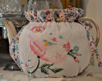 SMALL SIZED Drop In Snuggie Tea Cozy fits your 24-30 Oz teapot and is made with vintage embroidery kitten on a robin's egg blue floral print