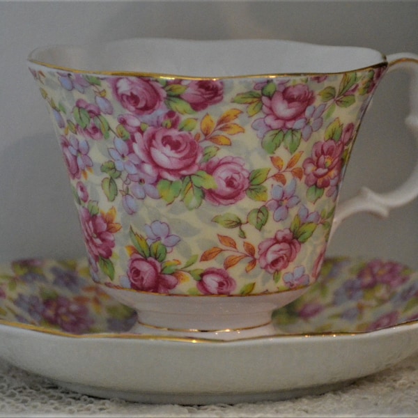 ROYAL ALBERT Chintz Roses floral Cup and Saucer with pink, yellow, green, lavender colors and pedestal base cup 1960's