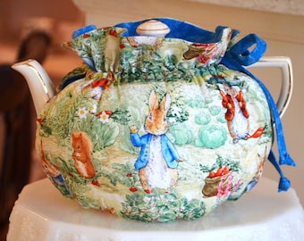 TEA COSY Standard Size Drop In Snuggie fits your 32-36 Oz teapot with Peter Rabbit and Benjamin Bunny lined Cyan Blue cotton.
