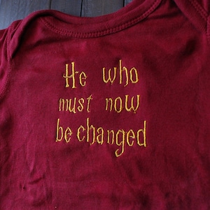 Must Now Be Changed - Baby Bodysuit