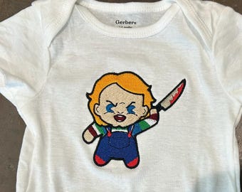 Body de bebé de muñeca apuñalada