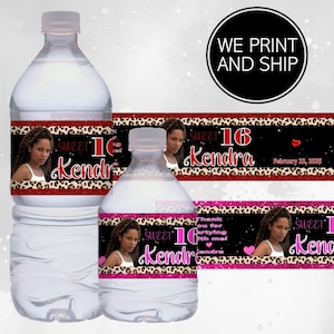 May include: Water bottle labels with a leopard print design and glitter accents. The labels feature a photo of a young woman and the text "Sweet 16 Kendra" with a heart and the date February 22, 2023.