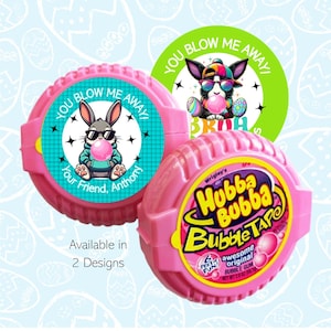 May include: Pink Hubba Bubba Bubble Tape with two different designs. One design features a cartoon bunny blowing a bubble, and the other features a cartoon dog blowing a bubble. The text "You Blow Me Away" is on both designs.