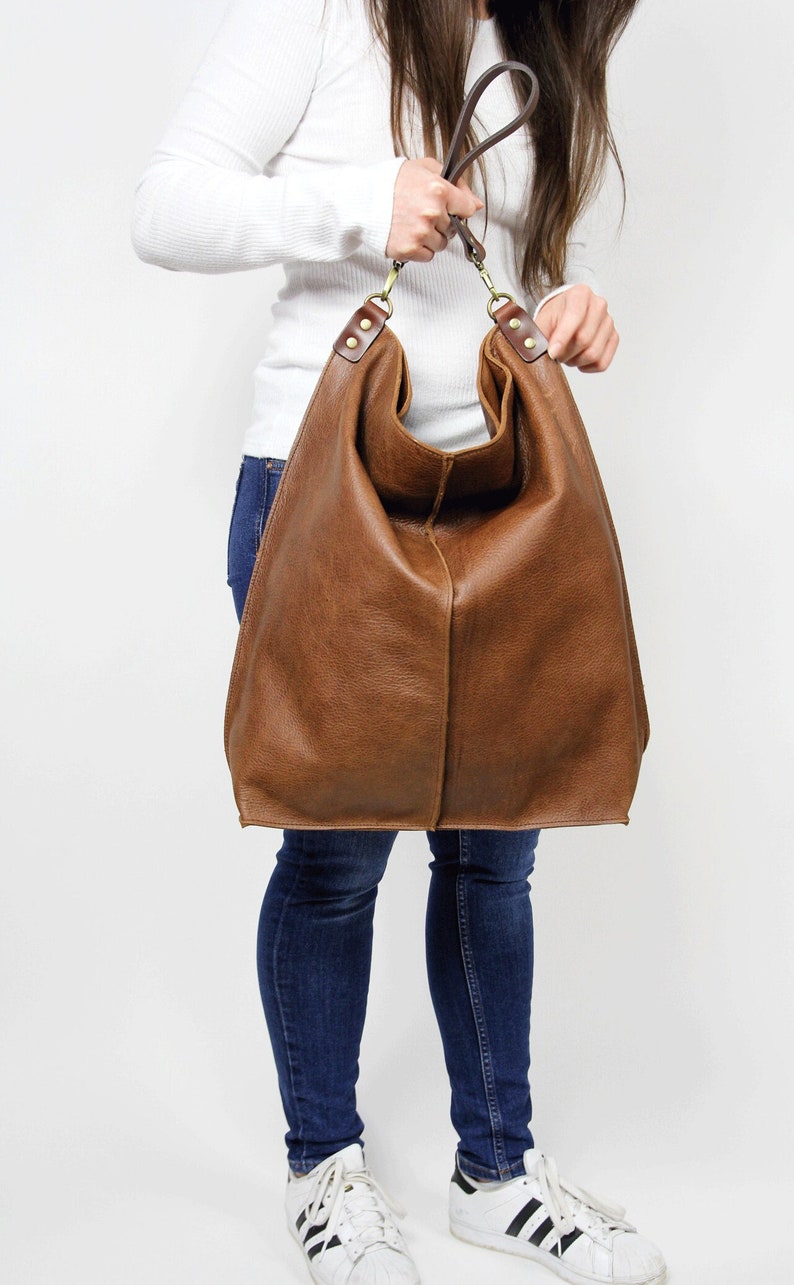 Upgrade your everyday style with this handmade oversized leather tote bag, designed to hold everything you need while staying effortlessly chic.