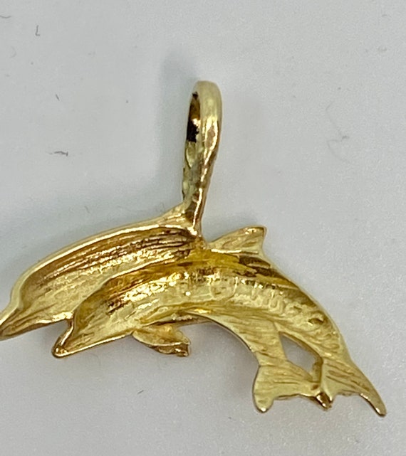 Vintage 14kt yellow gold double dolphin pendant. - image 2