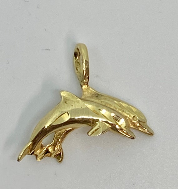 Vintage 14kt yellow gold double dolphin pendant. - image 1