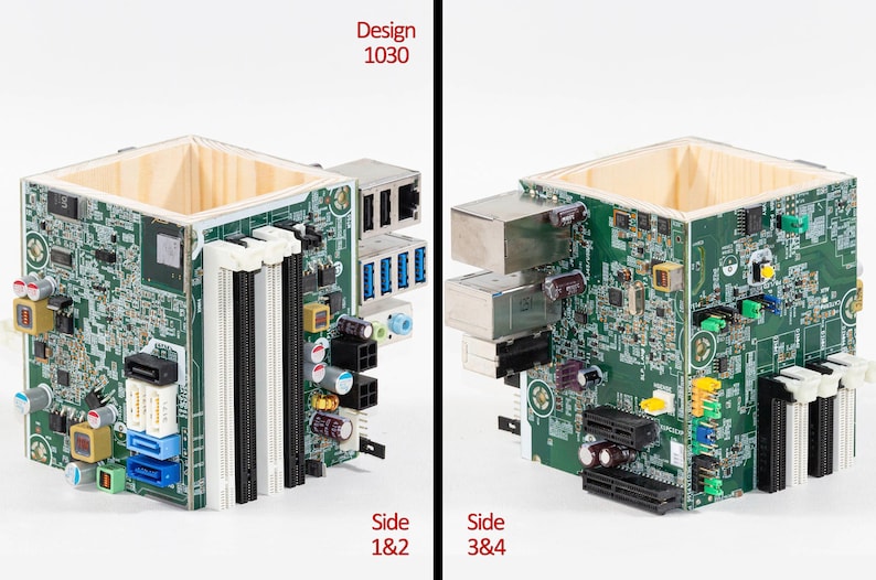 Puede incluir: Un recipiente cuadrado con la parte superior abierta, construido con placas de circuito impreso verdes que presentan varios componentes electr&oacute;nicos, incluyendo ranuras RAM, condensadores y puertos. El texto Design 1030, Side 1&2, Side 3&4 es visible.