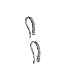 May include: A pair of silver earring hooks with clear crystal accents.
