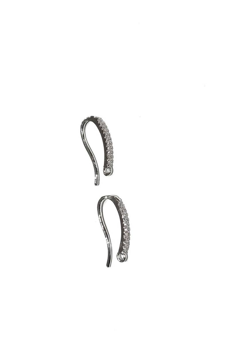 May include: A pair of silver earring hooks with clear crystal accents.
