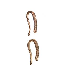 May include: Two gold-tone earring hooks with clear crystal accents.