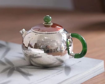 Pomelo-förmige, silberne Teekanne mit grünem Jade-Griff und Kupferdeckel