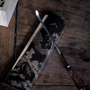 Silver Tea Scoop sculpted with Japanese-styled Landscape together with a tea spoon