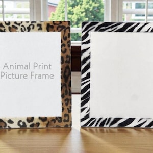 May include: Two picture frames with animal print borders. One frame has a leopard print pattern, and the other has a zebra stripe pattern. The text "Animal Print Picture Frame" is visible on the left frame.