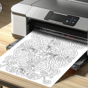 a printer with a picture of a flower on it