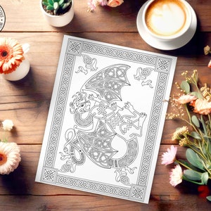 May include: A black and white printable coloring page featuring a Celtic knotwork dragon design. The dragon is curled up with its wings spread out. The design is surrounded by a border of Celtic knots.