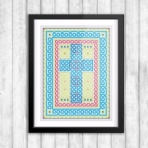 Könnte beinhalten: Gerahmte Kreuzstichkunst mit einem geometrischen Design in Blau-, Rosa-, Gelb- und Grüntönen. Das Kunstwerk ist in einem schwarzen Rahmen mit weißem Passepartout vor einem weißen Holzhintergrund ausgestellt.