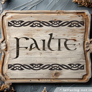 a wooden sign with the word fate on it