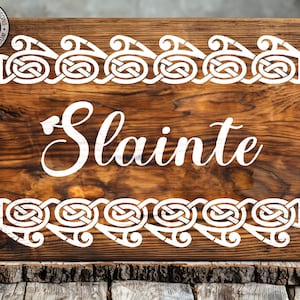 a wooden sign that says slante on it