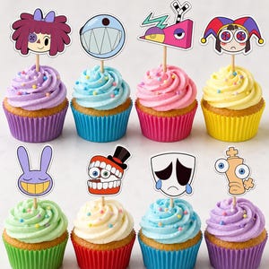 May include: Eight cupcakes in colourful paper liners topped with pastel frosting and sprinkles, each featuring a unique character topper on a wooden pick. The toppers include stylised faces, a jester hat, a mask, and various cartoonish designs.
