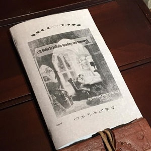 May include: A guide to initiatic reading and research, a black and white image of a person sitting at a desk in a room with a large window, the text "Hyperborean Research Society" is visible in the bottom right corner of the image.