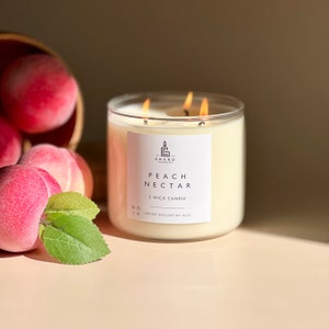 Peach Nectar Soy Wax Candle: Immerse in Lush, Juicy Peach Aromas – A Sweet Escape to Orchards with Every Light. Perfect for Uplifting Moods