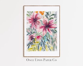 May include: Watercolor painting of pink flowers with green leaves and yellow accents. The painting is framed in a light wood frame and has the text "Once Upon Paper Co" at the bottom.