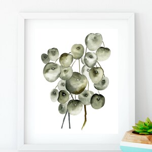 May include: A watercolor painting of a cluster of green and gray round leaves, resembling a plant with a delicate stem.