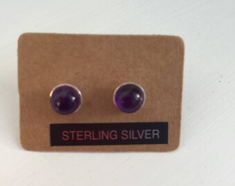Amethyst and Silver stud earrings .