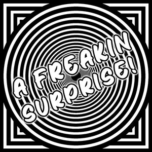 May include: A black and white image with a swirling, hypnotic pattern. The text "A FREAKIN SURPRISE!" is written in white, bold letters.