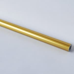 May include: A gold-coloured metal rod with a smooth, shiny finish.