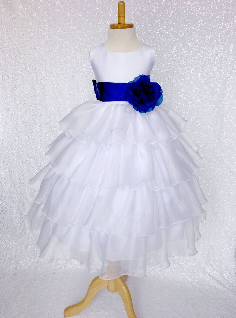 white dresses with blue satin sashes