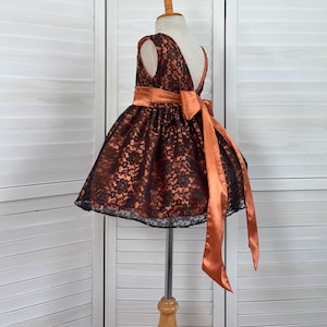 burnt orange and black dress Burnt orange asoebi dress with black velvet
