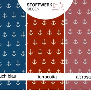 May include: Three fabric swatches with a white anchor pattern on a blue, red, and pink background. The swatches are labeled "rauch blau", "terracotta", and "alt rosa".