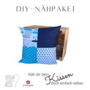May include: DIY sewing kit for a blue and white patterned pillow with a car and star design. The text on the image reads "DIY - NÄHPACKET Näh dir dein Kissen doch einfach selber".